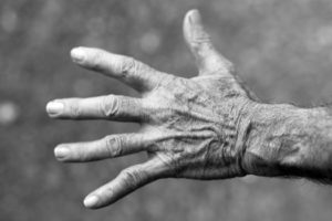 hand-elderly-woman-wrinkles-black-and-white-54321-medium